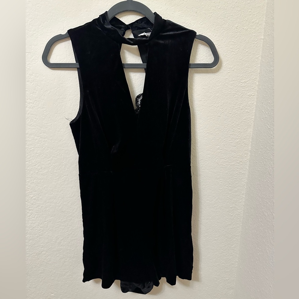 Stella Luce black romper with back lace detail